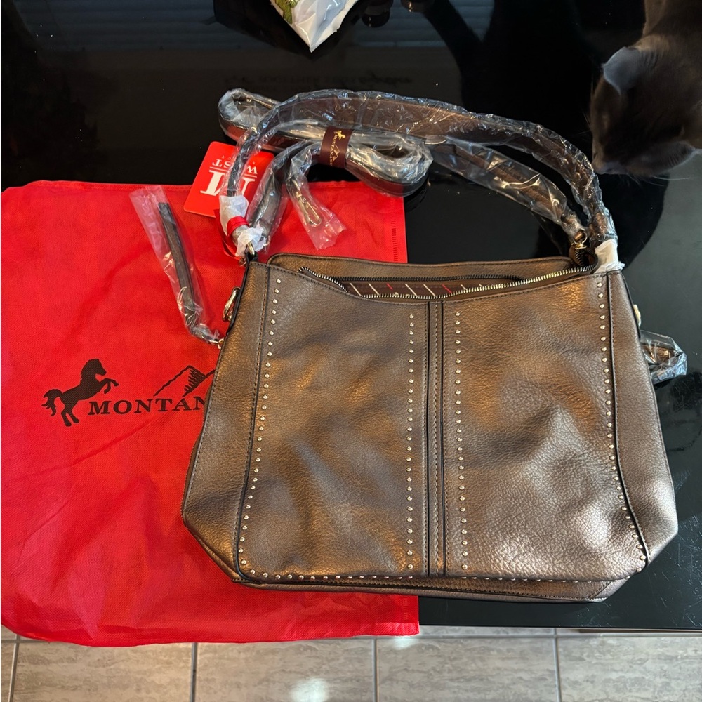 Brown copper ish leather with gold accents Montana west purse NWT